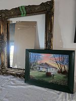 Overall lot showing antique frame, mirror panel, and framed painting