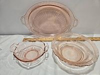 Front view of platter, dish, and bowl with ruler for size reference