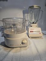 Black & Decker Handy Steamer with bowl and Osterizer blender with glass jar