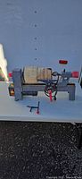 Full view Performax mini wood lathe on table with wood blank mounted