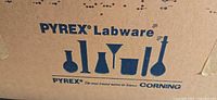 Cardboard shipping box printed with Pyrex Labware and Corning logos