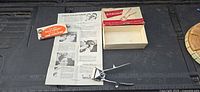 Entire lot: clipper, box components, instruction sheet, pamphlet