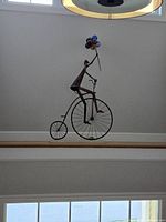 Full sculpture on ledge above doorway