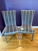 Front view of both gray striped chairs