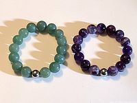 Both gemstone stretch bracelets side by side showing overall design