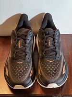 Top view of both shoes showing mesh uppers, laces, condition