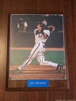 Front view of signed Ed Sprague photo on plaque