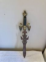 Full view of dagger front showing blade, guard and handle