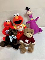 Group shot of all five plush toys together