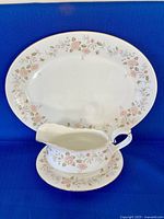 Platter, gravy boat and underplate grouped