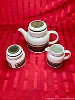 Front view of all three Royal Doulton Sienna pieces