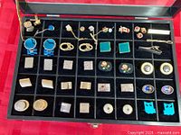 Full view of display case showing all accessories