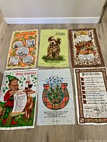 All six tea towels laid out on floor