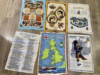 Five tea towels laid out showing all designs