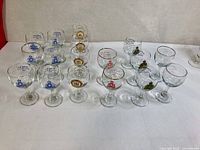All 17 RCMP wine glasses arranged on table