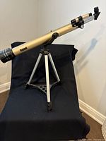 Full view of Bushnell telescope on tripod