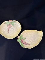 Top view of both yellow leaf dishes with foxglove motif
