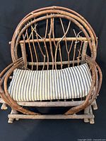 Front view of willow twig loveseat with cushion