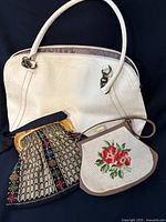 Front view of all three purses
