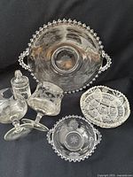 Group shot of all seven glass pieces