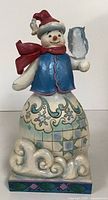 Front view of Jim Shore snowman figurine