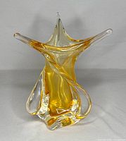 Front view of amber twisted spiral glass vase