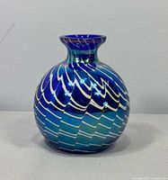 Front view of cobalt blue iridescent art glass bud vase