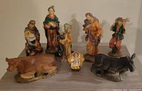 Group view of all nine nativity figurines