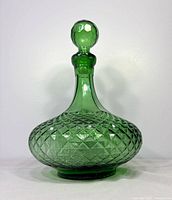 full view of green diamond pattern decanter front