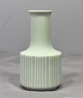 Front view of porcelain bud vase showing full shape