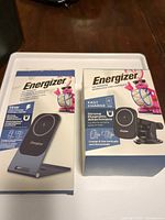 Front view of both boxed Energizer chargers