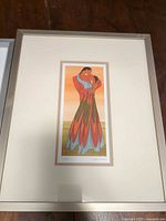 Front view of framed Lovers art print showing image, mat, and frame