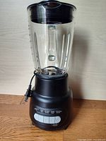 Full view of blender showing base, glass jar, control panel