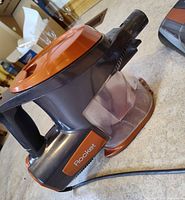 Handheld motor unit with dust cup