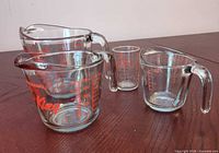 All four glass measuring pieces group view