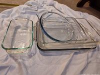 All five glass bakeware pieces stacked together