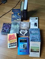 All ten books laid out to show front covers