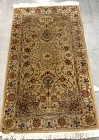 Full top view of entire rug showing overall pattern and fringe