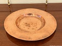 Top view of copper plate showing overall form and patina