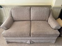 Front view of light beige loveseat sofa