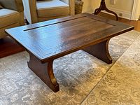 Entire coffee table angled view showing style and legs