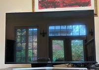 Front view of Samsung TV on stand