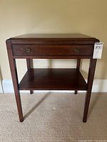 Full view of side table showing drawer, shelf and legs