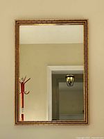 Full view of rectangular mirror on wall