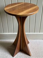 Full view of cherry pedestal side table
