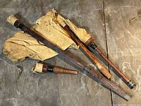 Full set of bagpipe components on floor