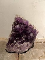 Front view of purple amethyst geode showing crystal formation