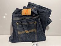Folded Nudie Jeans showing overall color and folded legs