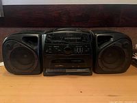 Front view of Sanyo BassXpander boombox showing speakers and controls