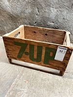 Front view showing 7-UP logo and overall crate condition